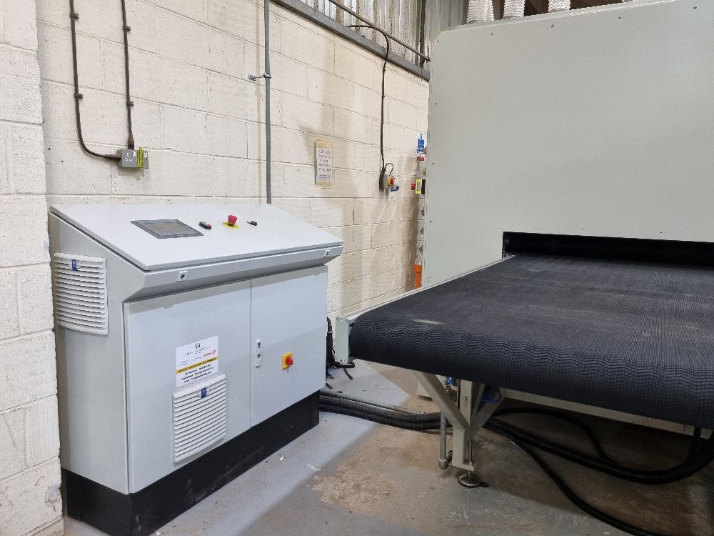 Double sander control panel shown alongside the sanding machine